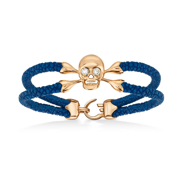 B430 Rose Gold Skull with Diamond Eyes on Blue Stingray